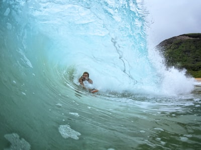 Under the waves of surfing
